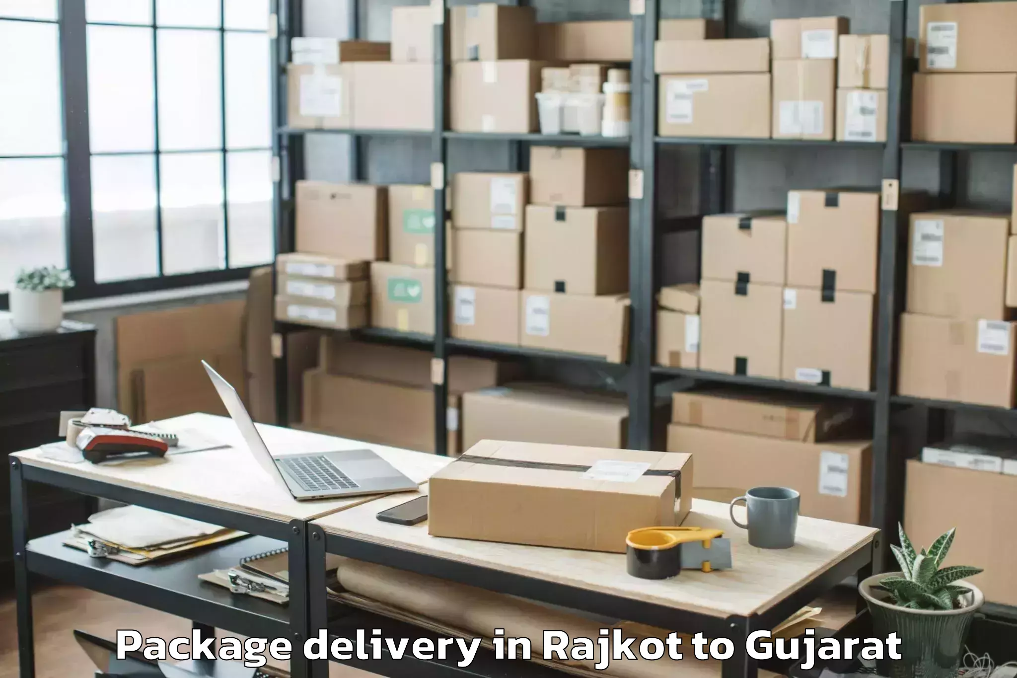 Trusted Rajkot to Gujarat University Of Transpla Package Delivery